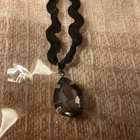 Black colored corded ribbon shaped with jewel pendant. New in package - Picture 2 of 5